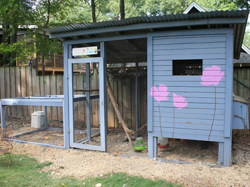 chicken coop with painted flowers